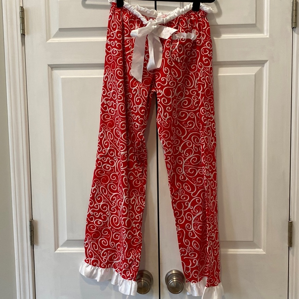Mud Pie- ladies Christmas PJ bottoms Red with white swirls and satin ruffles